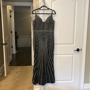 Beautiful+elegant backless Jovani dress.Black w/silver beads.Could prob fit 8-10